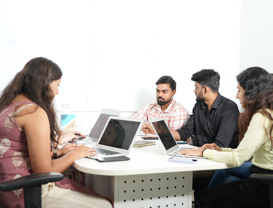 Team meeting discussing healthcare SEO strategies